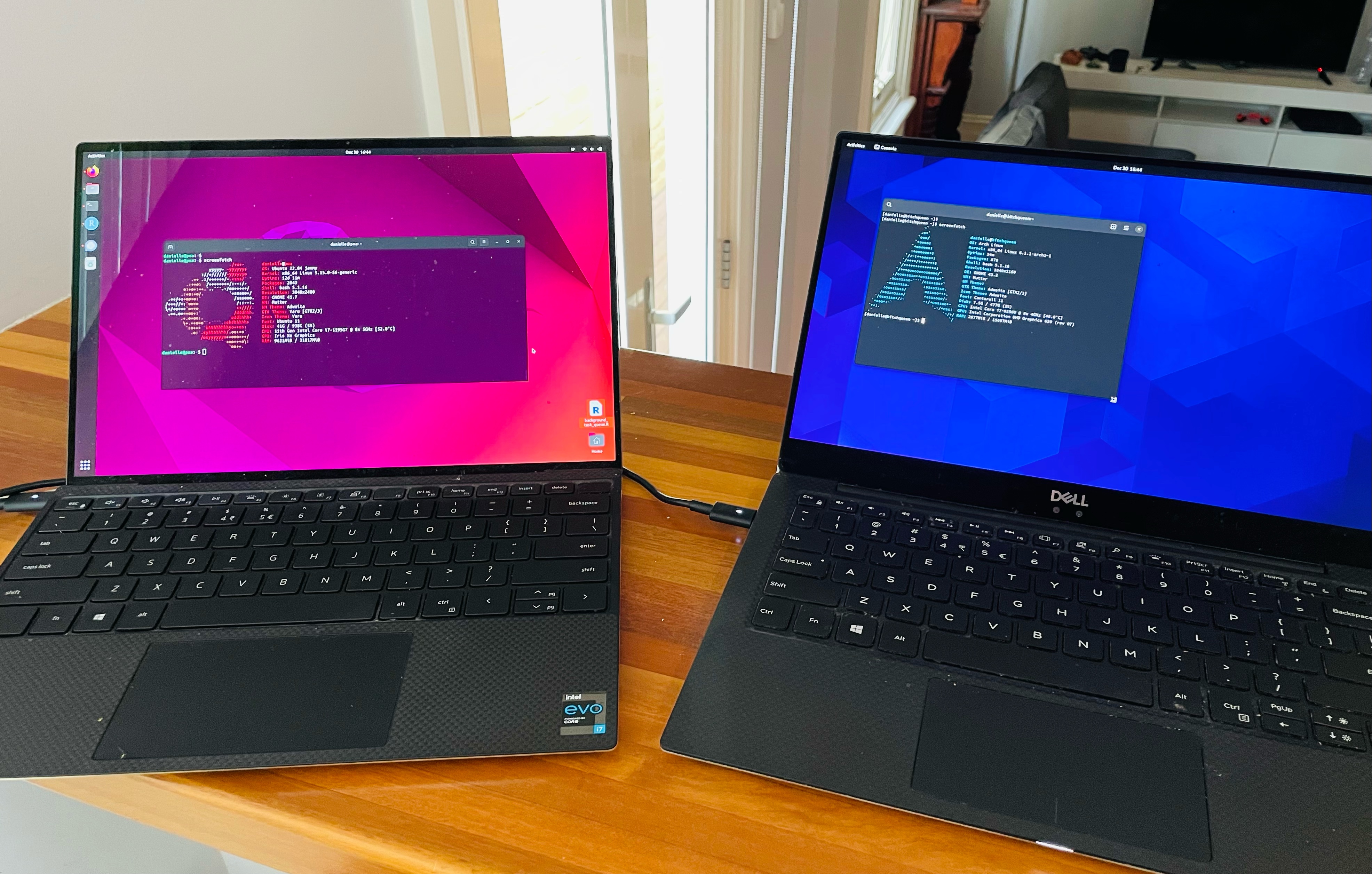 My regular laptop running Ubuntu (on the left) and the newly-built Arch laptop (on the right)