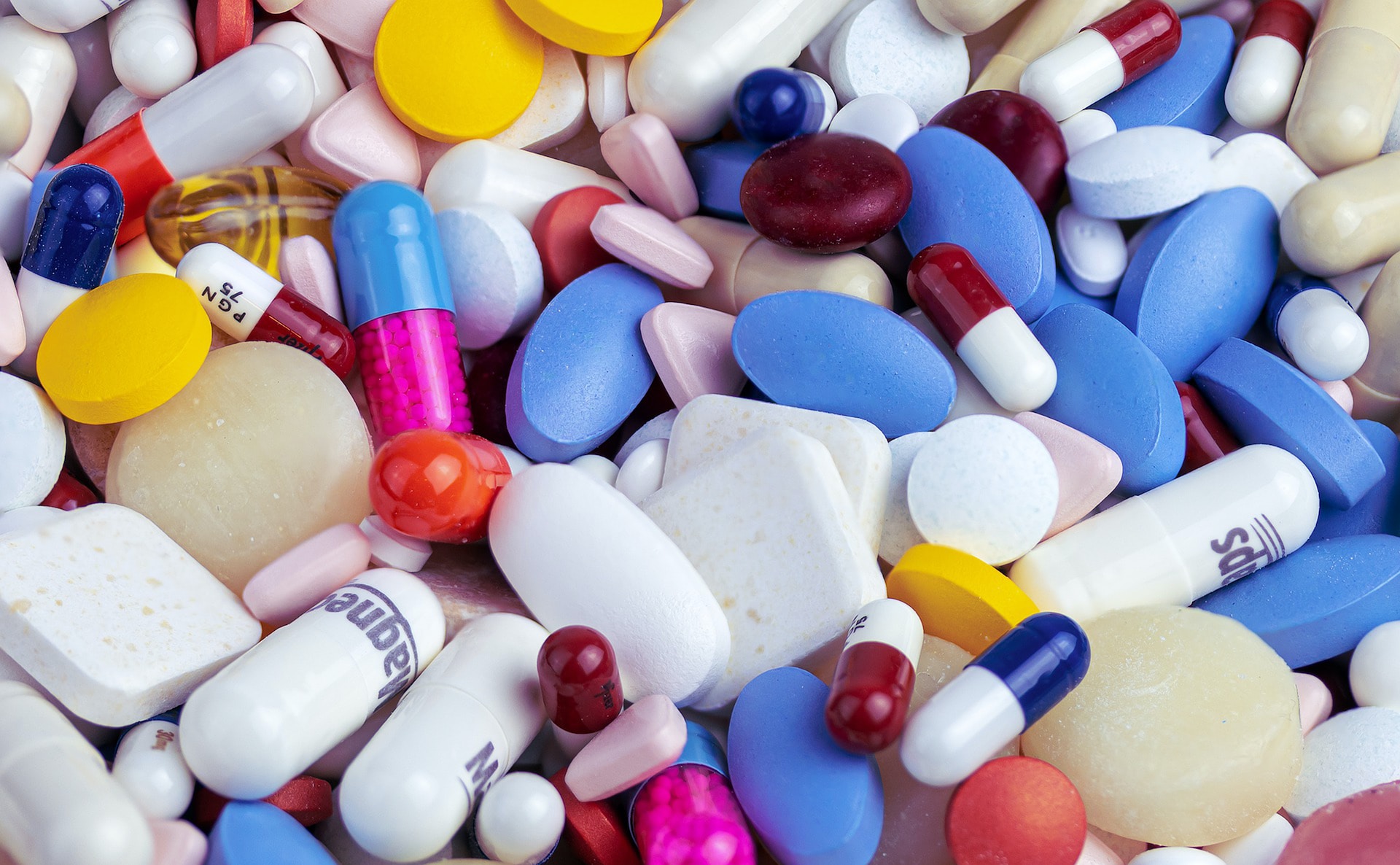 Colourful photo of many pills and tablets